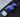 Smartphone with charging icon, wireless charger, and white case on a dark surface