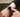 Close-up of a person interacting with a smartwatch, highlighting modern wearable technology