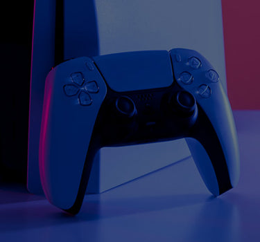 Gaming controller on a reflective surface with a gradient background