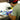 A technician fixing a cell phone on a table with precision tool